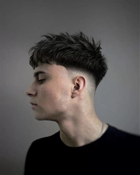 textured fringe with mid taper|low taper fade with textured fringe.